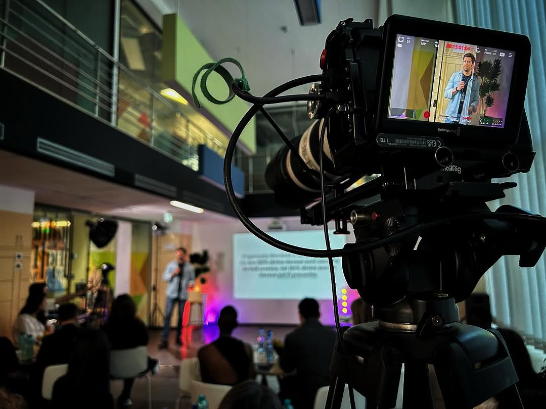 Blackmagic cinema camera with SmallRig cage filming a live event